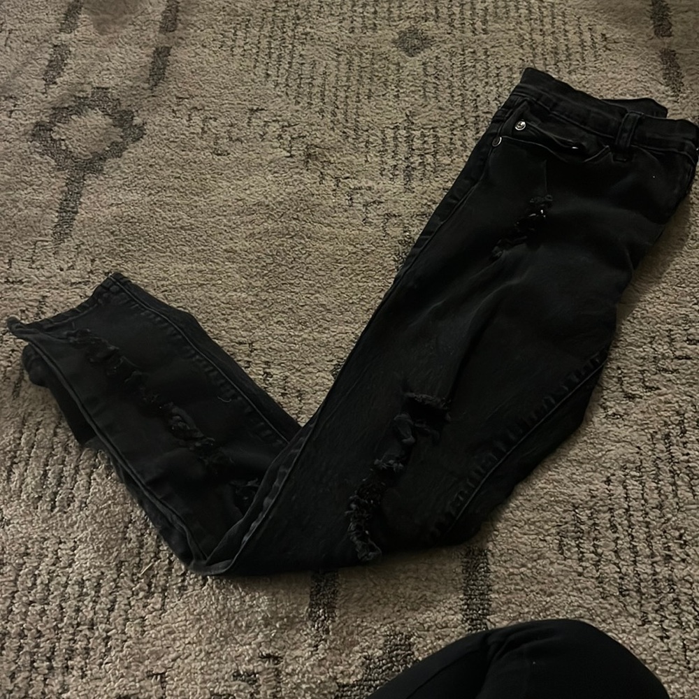 Black jeans with holes